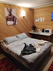 TV a/nebo společenská místnost v ubytování Habitación Coigue