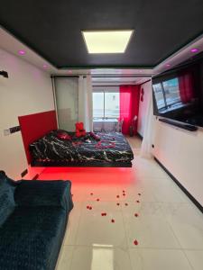 a bedroom with a bed with blood on the floor at C12 Deluxe in Cap d'Agde