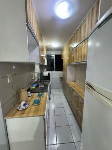 Dapur atau dapur kecil di Ótimo apartamento aconchegante