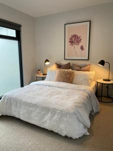 Ένα ή περισσότερα κρεβάτια σε δωμάτιο στο Modern, stylish 2 bed apartment, great location