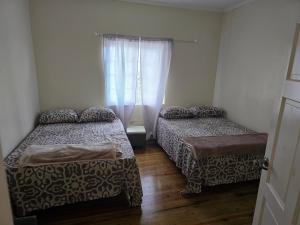 Katil atau katil-katil dalam bilik di Jay's Guest House II