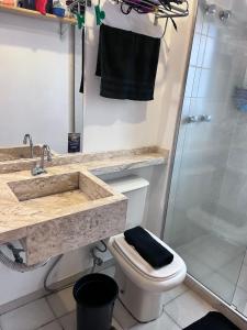 Koupelna v ubytování Apartamento dentro de Hotel jardins garagem inclusa