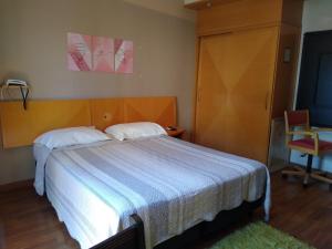 Postel nebo postele na pokoji v ubytování Apartamento dentro de Hotel jardins garagem inclusa