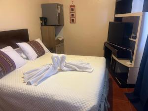 Postel nebo postele na pokoji v ubytování Habitación Quyllur Ancestral