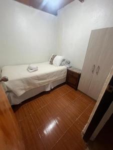 En eller flere senge i et værelse på Estrella Ancestral