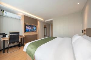 صورة لـ 沃德 Smart 酒店淄博桓台信誉楼张北路店 في تزيبو