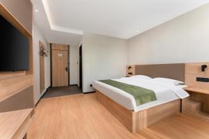 صورة لـ 沃德 Smart 酒店淄博桓台信誉楼张北路店 في تزيبو +20 صورة