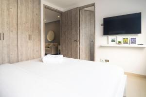 TV a/nebo společenská místnost v ubytování 501 - Spectacular apartment - Air conditioning