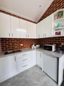 Eldhús eða eldhúskrókur á Studio in CBD Bathurst