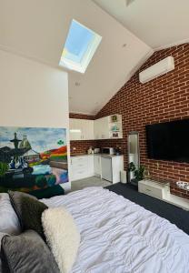 Sjónvarps- og/eða afþreyingartæki á Studio in CBD Bathurst