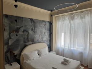 Posteľ alebo postele v izbe v ubytovaní Flat in Duomo