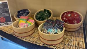 a table topped with five bowls filled with differentiatesiatesiatesiatesktop at Richmond Hotel Akita Ekimae in Akita
