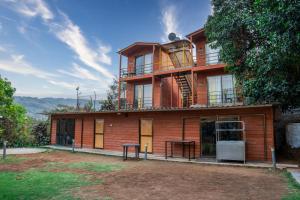 a large building with a table in front of it at Bhairavnath Resort and Hospitality in Lonavala