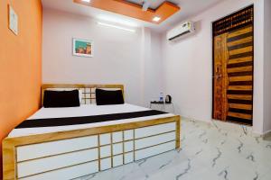 Postel nebo postele na pokoji v ubytování SPOT ON The SN Lawn + 25 fotografií