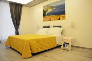 Letto o letti in una camera di B&B WelcHome