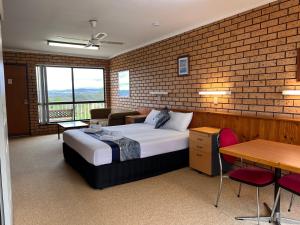 Postel nebo postele na pokoji v ubytování Bayview Motor Inn