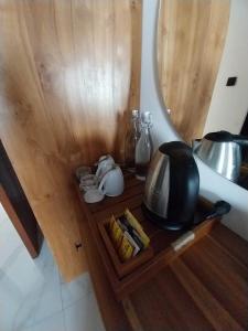 Kuchyň nebo kuchyňský kout v ubytování Sujiwa Ubud Hotel & Villa