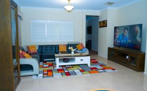 Χώρος καθιστικού στο Charming Family Home