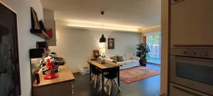 a living room with a couch and a table at Casa STELLA in Mirano