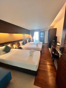 Katil atau katil-katil dalam bilik di Nordwind Hotel