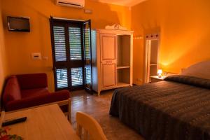 Postel nebo postele na pokoji v ubytování Hotel Oriente