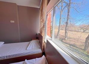 Postel nebo postele na pokoji v ubytování Park Hotel Kekava