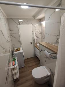 Koupelna v ubytování Apartments Šarić
