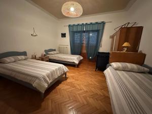 Postel nebo postele na pokoji v ubytování Villetta la Fortezza