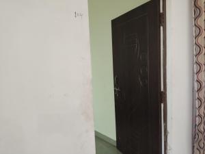 a door in a room with the word help written on it at Shree shyam vashno in Jāmb