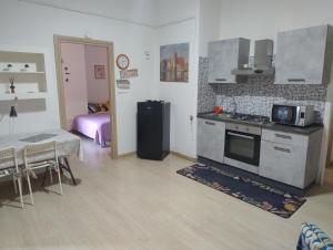 Kuchyňa alebo kuchynka v ubytovaní Giordiehouse 1 + 13 fotografií