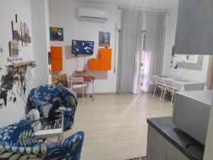 Televízia a/alebo spoločenská miestnosť v ubytovaní Giordiehouse 1