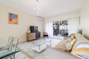 Et tv og/eller underholdning på MARYNAN 1 - Spacieux appartement face à la mer