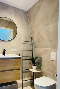 Ένα μπάνιο στο Vakantieappartement Oostkapelle