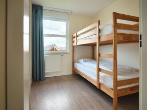 Dormio Resort Berck-sur-Mer tesisinde bir odada yatak veya yataklar +23 fotoğraf