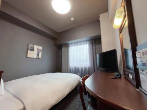 TV a/nebo společenská místnost v ubytování Hotel Route-Inn Toki