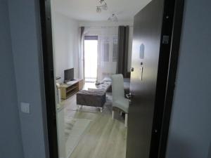 Postel nebo postele na pokoji v ubytování Aqua Lux Apartman