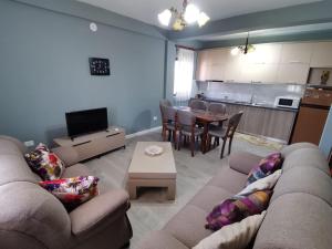 Kuchyň nebo kuchyňský kout v ubytování Leatis Apartment