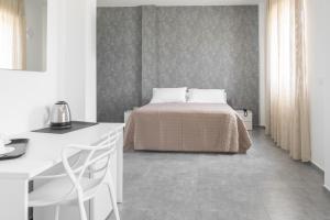 Postel nebo postele na pokoji v ubytování Hotel Bastione