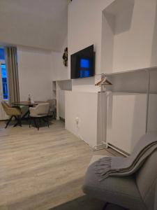 a living room with a couch and a table at 8z dreamz 4 in Ghent +7 photos