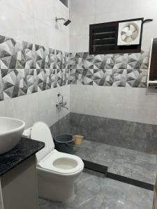 Koupelna v ubytování Franklin's Finestay + 8 fotografií