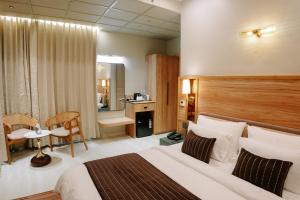 Ένα ή περισσότερα κρεβάτια σε δωμάτιο στο Villasita Resort