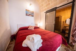 Postel nebo postele na pokoji v ubytování POLIGNANO BONITA + 33 fotografií