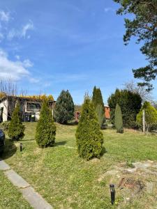 Vonkajšia záhrada v ubytovaní Útulná chata přímo u přehrady + 12 fotografií