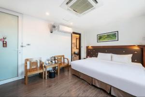 Ένα ή περισσότερα κρεβάτια σε δωμάτιο στο A25 Hotel - 28 Trần Quý Cáp