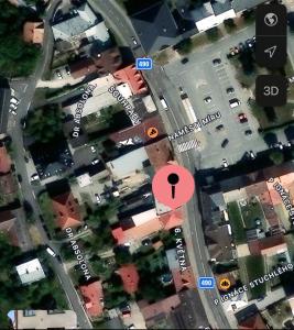 a map of a street with a red circle at Apartmán na náměstí Fryšták in Zlín