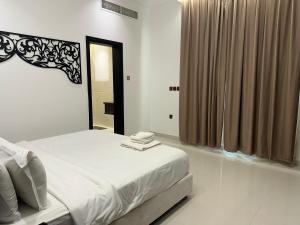 Letto o letti in una camera di Dibba Sea View Hotel by AMA Pro