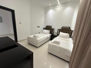 Letto o letti in una camera di Dibba Sea View Hotel by AMA Pro
