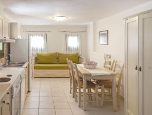 A kitchen or kitchenette at Asplathia Villas Lefkada