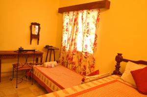 Letto o letti in una camera di Sneh Deep Guest House