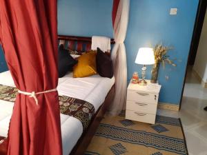 Postel nebo postele na pokoji v ubytování White Guest House -Kakiri